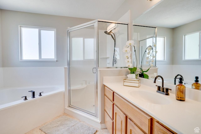 676 S 620 E, Heber City, UT 84032 - full bathroom with vanity, a bath, a shower stall, and plenty of natural light