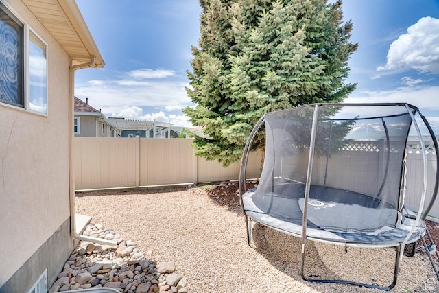 676 S 620 E, Heber City, UT 84032 - fenced backyard with a trampoline