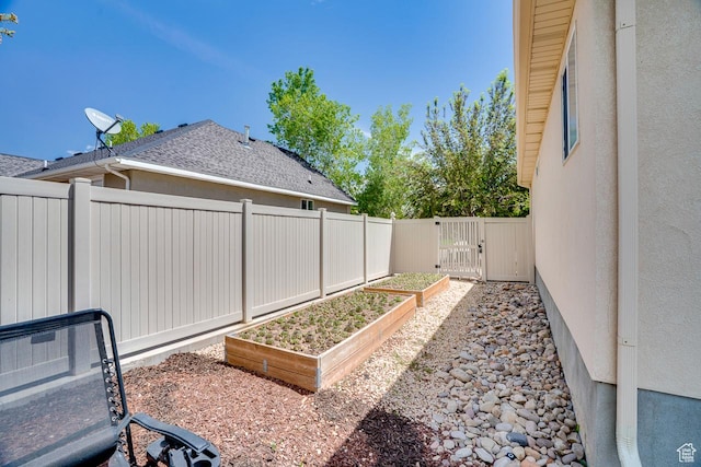 676 S 620 E, Heber City, UT 84032 - fenced yard featuring a garden and a gate