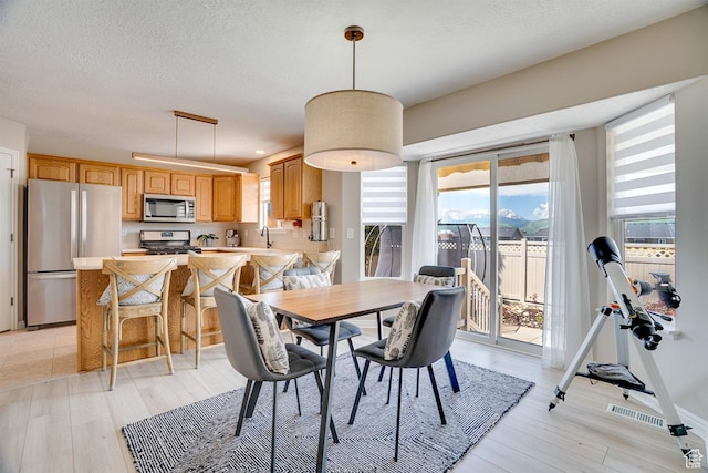 676 S 620 E, Heber City, UT 84032 - dining area featuring light wood finished floors