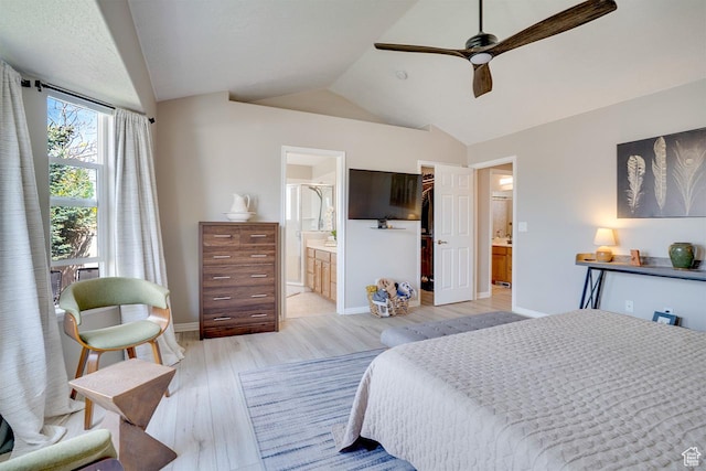 676 S 620 E, Heber City, UT 84032 - bedroom featuring vaulted ceiling, ensuite bathroom, a spacious closet, light wood-style floors, and baseboards