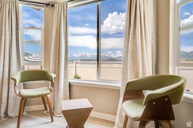 676 S 620 E, Heber City, UT 84032 - living area featuring wood finished floors, baseboards, and a mountain view