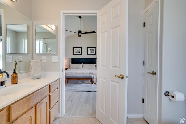 676 S 620 E, Heber City, UT 84032 - bathroom featuring vanity, ceiling fan, ensuite bath, tile patterned flooring, and vaulted ceiling