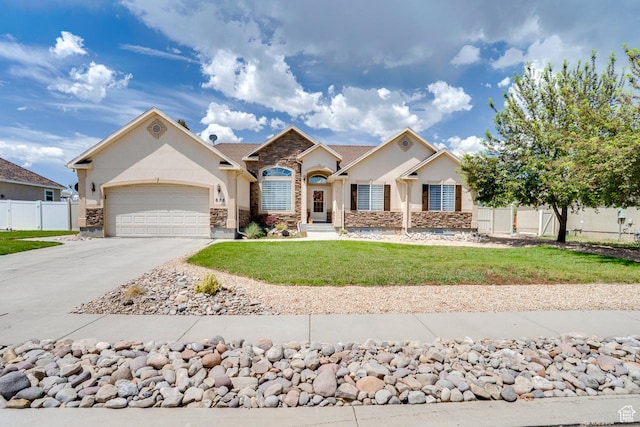 676 S 620 E, Heber City, UT 84032 - view of front of house featuring stone siding, stucco siding, an attached garage, and concrete driveway