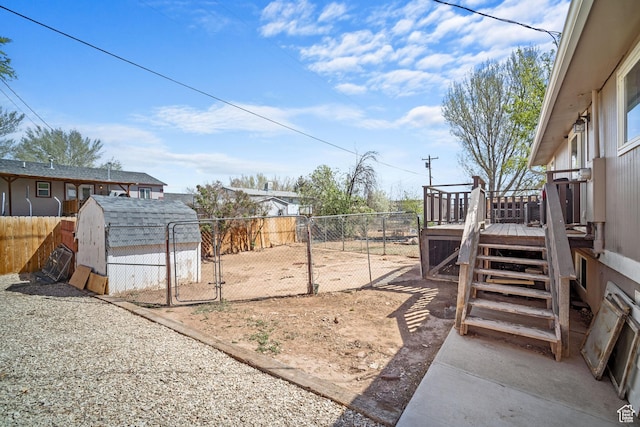 537 E 650 N, Roosevelt, UT 84066 - view of yard with a deck, a fenced backyard, and a gate