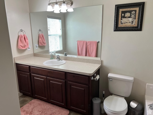 272 W 680 N, Centerville, UT 84014 - bathroom featuring toilet, tile patterned flooring, and vanity