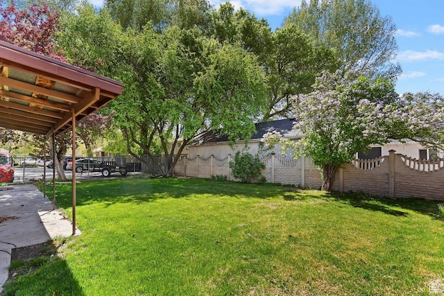 view of yard with fence