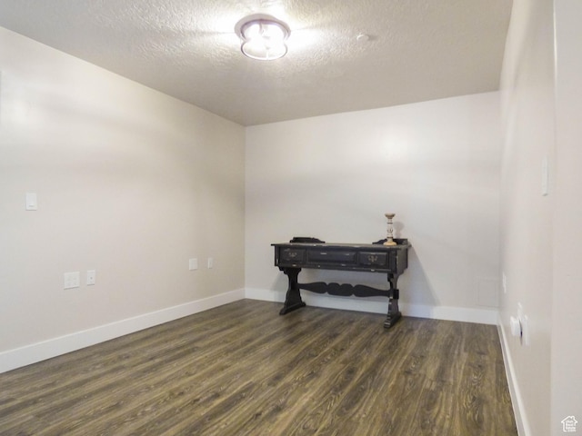4718 E Cougar Run S, Ut, UT 84629 - spare room with a textured ceiling, dark wood-style flooring, and baseboards