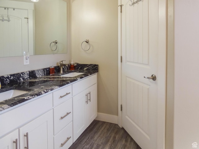 4718 E Cougar Run S, Ut, UT 84629 - full bath featuring double vanity, a sink, wood finished floors, and baseboards