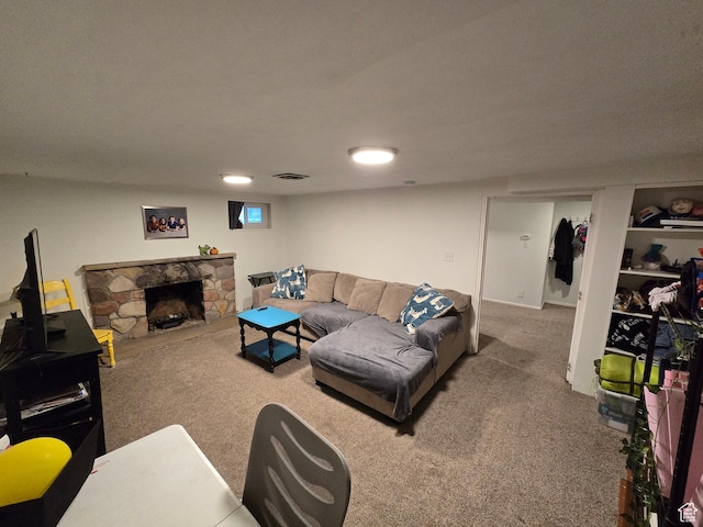 5841 S 129 W, Murray, UT 84107 - living area featuring a stone fireplace, visible vents, and carpet floors