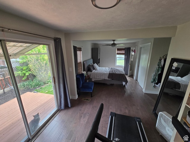 5841 S 129 W, Murray, UT 84107 - bedroom with baseboards, access to outside, visible vents, and dark wood-type flooring