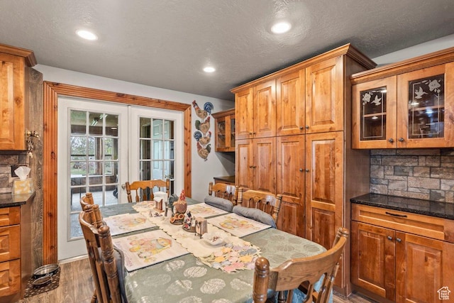 3168 W 1300 N, Clinton, UT 84015 - dining room featuring wood finished floors, french doors, recessed lighting, and a textured ceiling