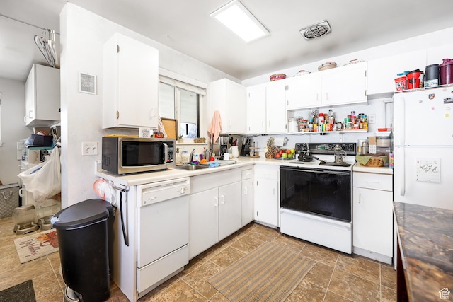 4222 S 1100 E, Millcreek, UT 84124 - kitchen with visible vents, white appliances, open shelves, and white cabinets