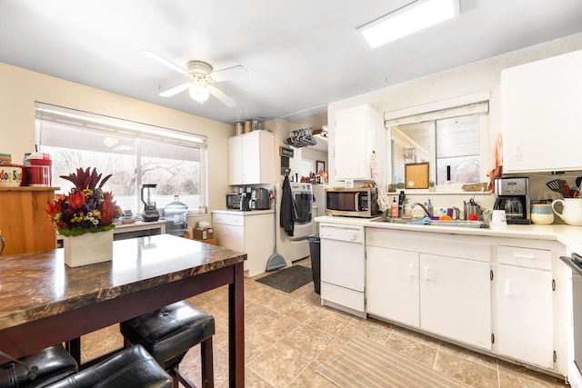 4222 S 1100 E, Millcreek, UT 84124 - kitchen with white cabinetry, stainless steel microwave, a sink, dishwasher, and a ceiling fan