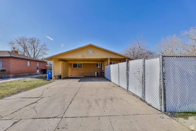 4222 S 1100 E, Millcreek, UT 84124 - view of front of house with fence, a carport, and concrete driveway