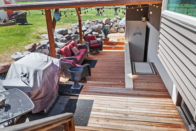 deck featuring a yard