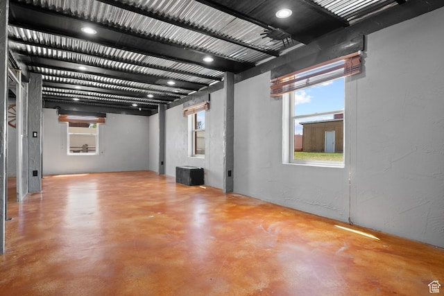 basement featuring a textured wall