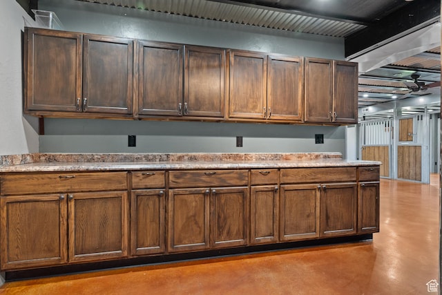 kitchen with finished concrete floors