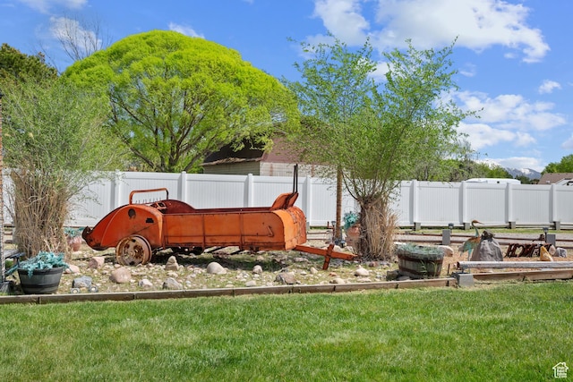 view of yard with fence