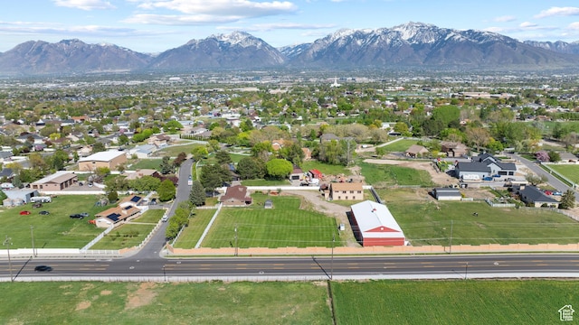 birds eye view of property featuring a mountain view and a residential view