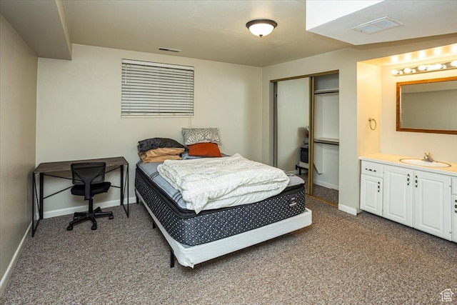 556 W 800 N Unit 15, Provo, UT 84601 - bedroom featuring dark carpet, visible vents, baseboards, and a sink