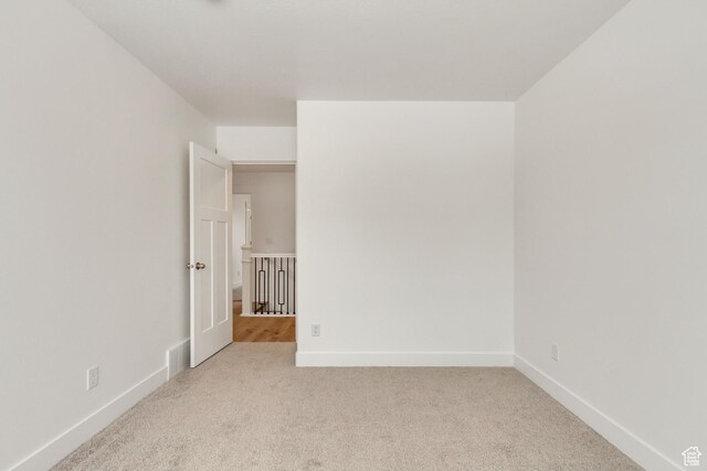 188 E Bruin Dr, Eagle Mountain, UT 84005 - carpeted empty room featuring baseboards