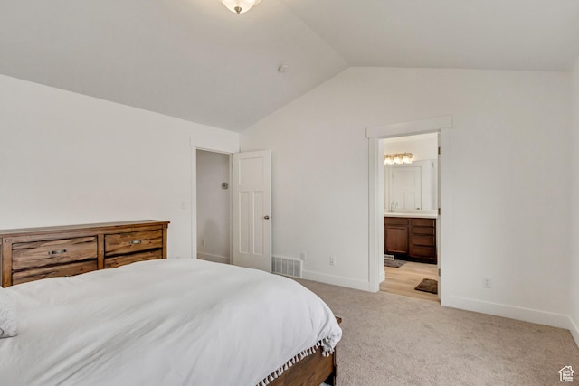 188 E Bruin Dr, Eagle Mountain, UT 84005 - carpeted bedroom featuring vaulted ceiling and ensuite bath