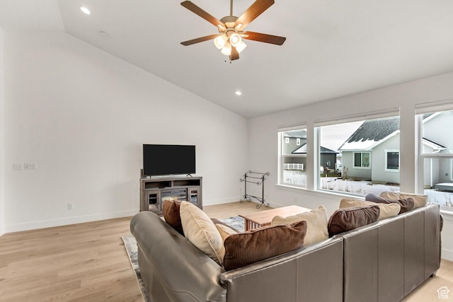 188 E Bruin Dr, Eagle Mountain, UT 84005 - living area with lofted ceiling, a ceiling fan, light wood-style flooring, and recessed lighting