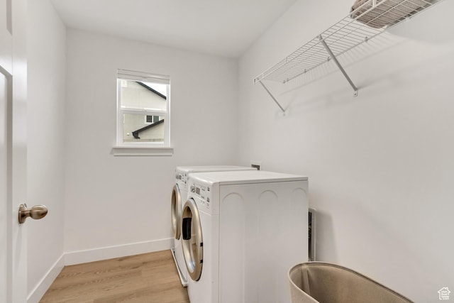 188 E Bruin Dr, Eagle Mountain, UT 84005 - washroom featuring washer and dryer and light wood-type flooring