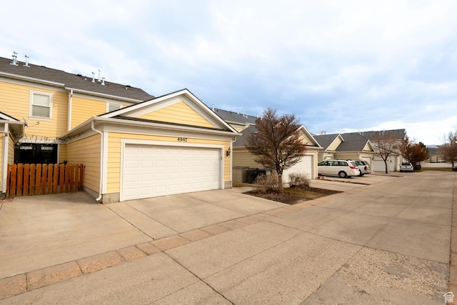 4947 W Calton Ln, South Jordan, UT 84009 - traditional-style house with fence and concrete driveway