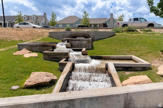 4947 W Calton Ln, South Jordan, UT 84009 - view of community featuring a residential view and a lawn