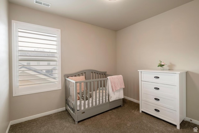 4947 W Calton Ln, South Jordan, UT 84009 - bedroom featuring visible vents, a nursery area, dark colored carpet, and baseboards