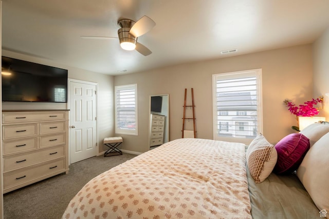 4947 W Calton Ln, South Jordan, UT 84009 - bedroom featuring baseboards, visible vents, dark carpet, and a ceiling fan