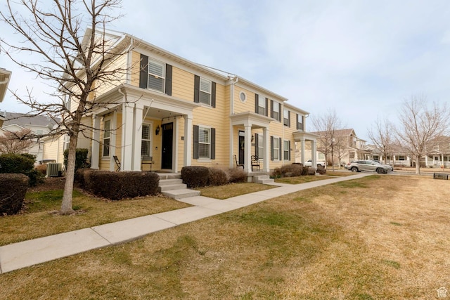 4947 W Calton Ln, South Jordan, UT 84009 - view of front of property with central AC unit and a front yard