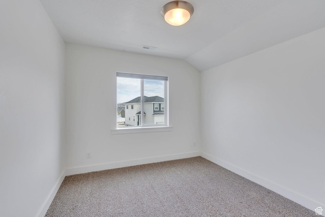 3498 N Delta St, Eagle Mountain, UT 84005 - spare room with carpet flooring, baseboards, and vaulted ceiling