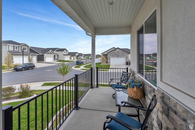 3498 N Delta St, Eagle Mountain, UT 84005 - covered porch with a residential view