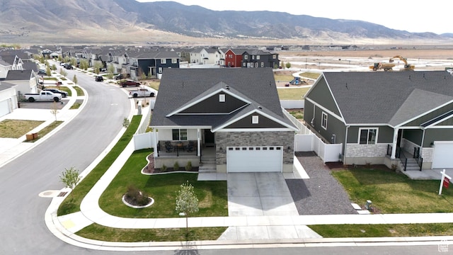 3498 N Delta St, Eagle Mountain, UT 84005 - aerial perspective of suburban area featuring a mountain backdrop