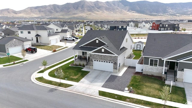 3498 N Delta St, Eagle Mountain, UT 84005 - aerial perspective of suburban area featuring a mountainous background