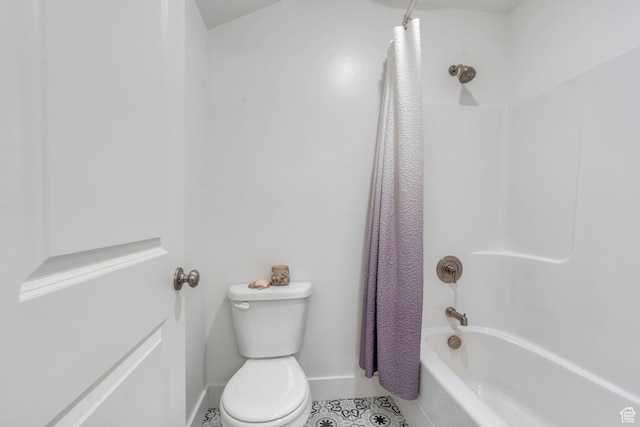 3498 N Delta St, Eagle Mountain, UT 84005 - full bath featuring toilet, tile patterned flooring, shower / bathtub combination with curtain, and baseboards