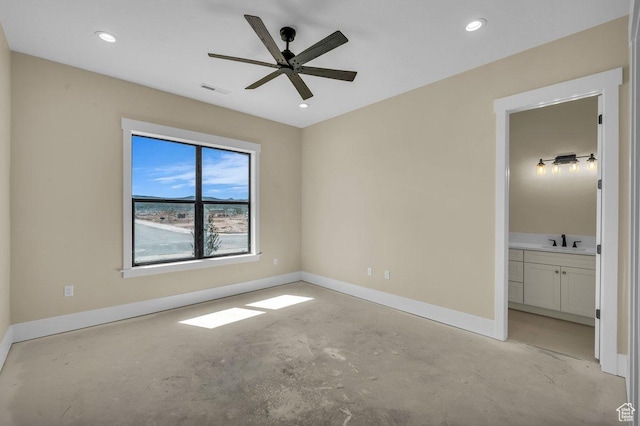 1907 S 950 W, Hurricane, UT 84737 - unfurnished bedroom with connected bathroom, concrete floors, a sink, baseboards, and visible vents