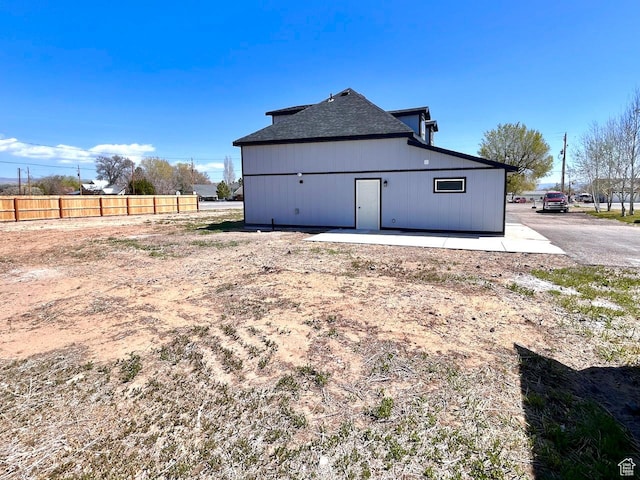 991 N 2500 W, Vernal, UT 84078 - rear view of property with fence and roof with shingles