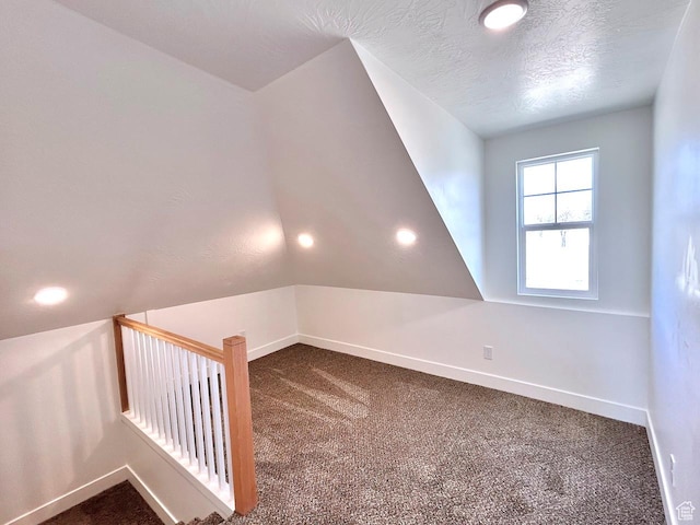 991 N 2500 W, Vernal, UT 84078 - additional living space featuring dark carpet, a textured ceiling, recessed lighting, and baseboards
