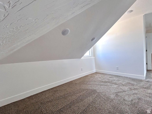 991 N 2500 W, Vernal, UT 84078 - bonus room featuring vaulted ceiling, carpet floors, and baseboards