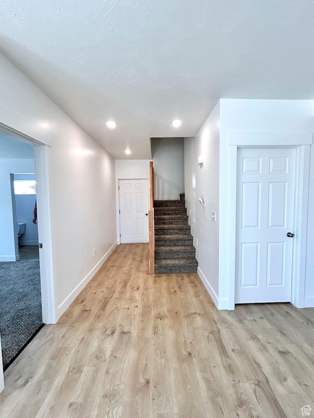 991 N 2500 W, Vernal, UT 84078 - interior space featuring stairs, light wood-style flooring, and baseboards