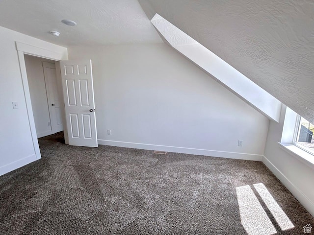 991 N 2500 W, Vernal, UT 84078 - bonus room with lofted ceiling, carpet, visible vents, and baseboards
