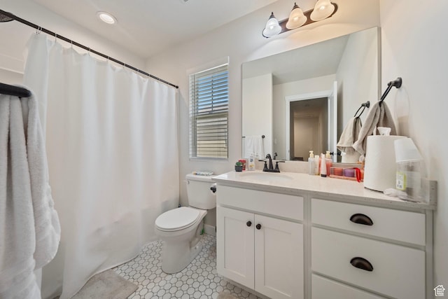 11412 S Regalstone Dr, South Jordan, UT 84009 - full bathroom featuring shower / tub combo with curtain, vanity, and toilet
