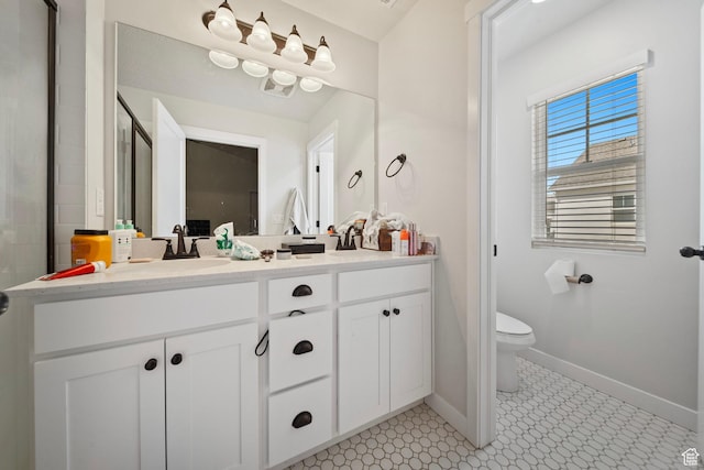 11412 S Regalstone Dr, South Jordan, UT 84009 - bathroom featuring toilet, baseboards, and vanity