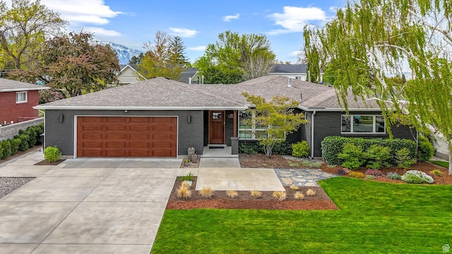 ranch-style house featuring driveway, a shingled roof, and brick siding