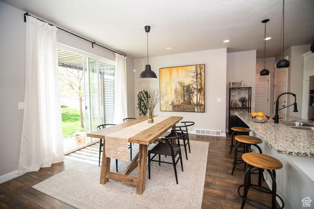 2021 W Kamari Dr, South Jordan, UT 84095 - dining room with dark wood finished floors, recessed lighting, visible vents, and baseboards