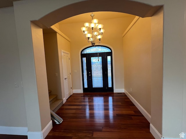 5867 W 4000 N, Roosevelt, UT 84066 - entryway featuring an inviting chandelier, wood finished floors, and arched walkways